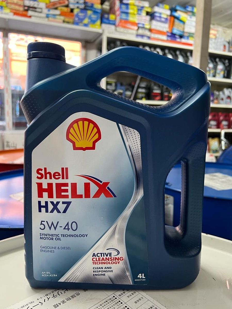 Моторное масло helix hx7. Шел Зеликс 5/40 серебристая бутылка.